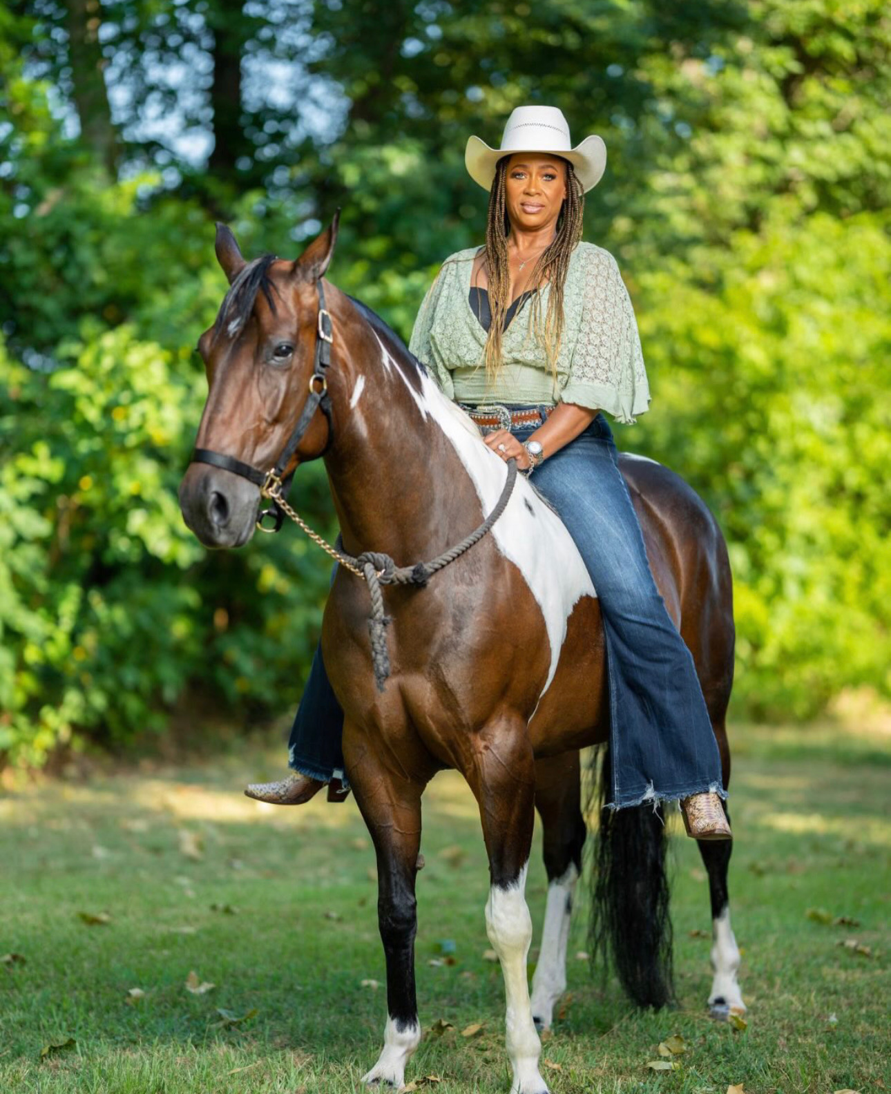 Tiffany Rachal on horseback in cowboy hat